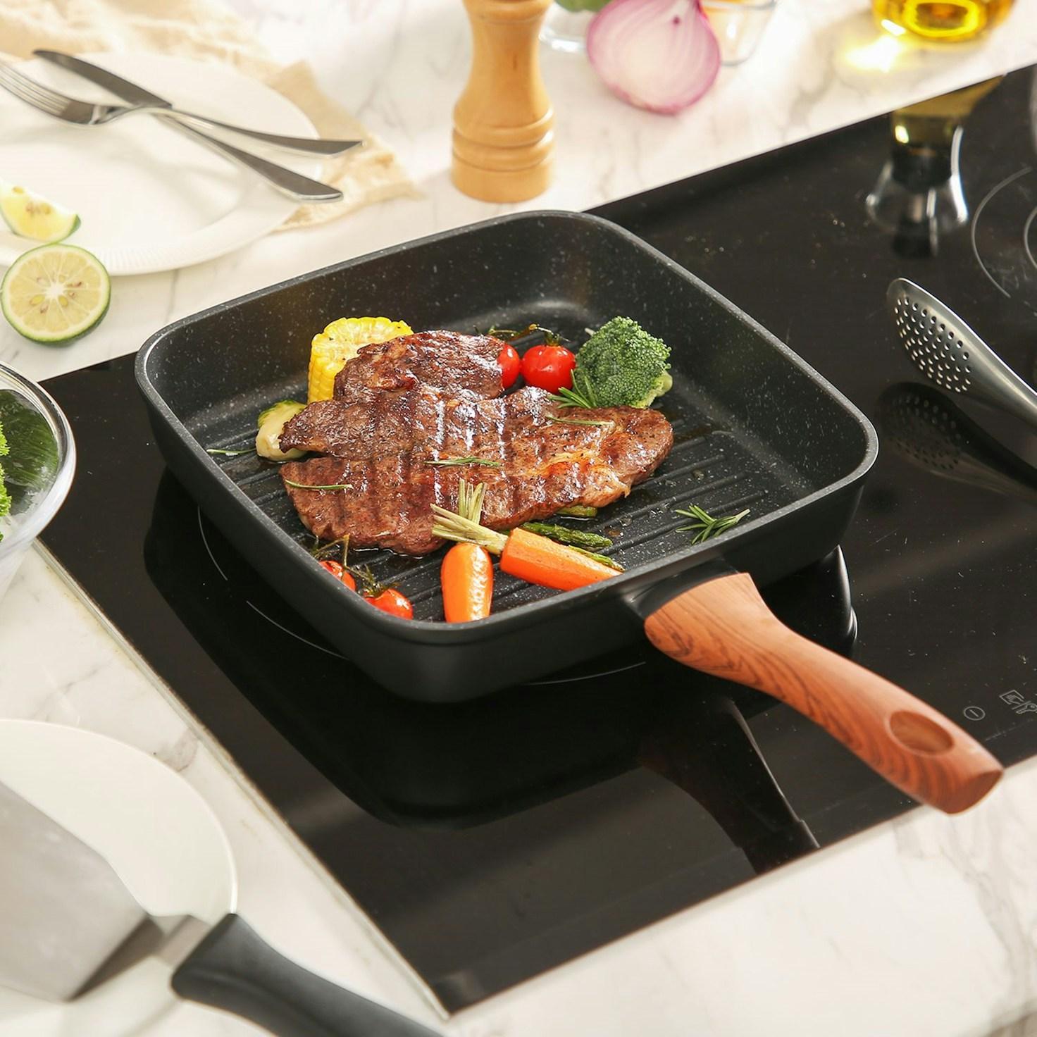 People collaborating in a contemporary kitchen, exchanging recipes and techniques